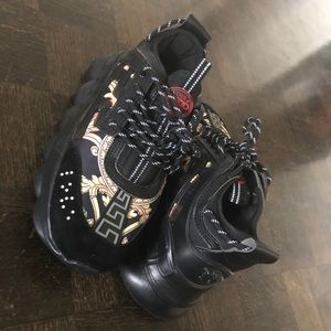 Versace chain reaction sneakers black and gold